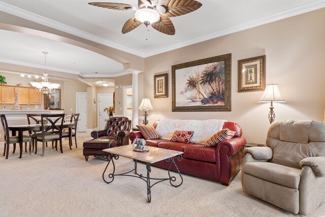 2180 Waterview Dr Unit 634, North Myrtle Beach, SC 29582 - living room with crown molding, decorative columns, light carpet, arched walkways, and ceiling fan with notable chandelier