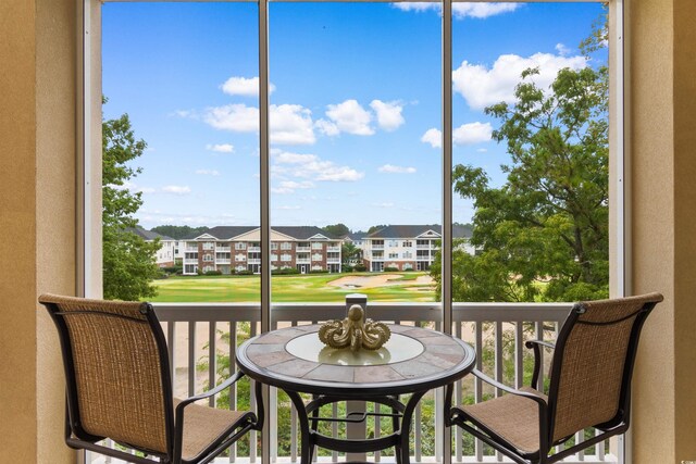 2180 Waterview Dr Unit 634, North Myrtle Beach, SC 29582 - sunroom featuring a residential view, a wealth of natural light, and golf course view