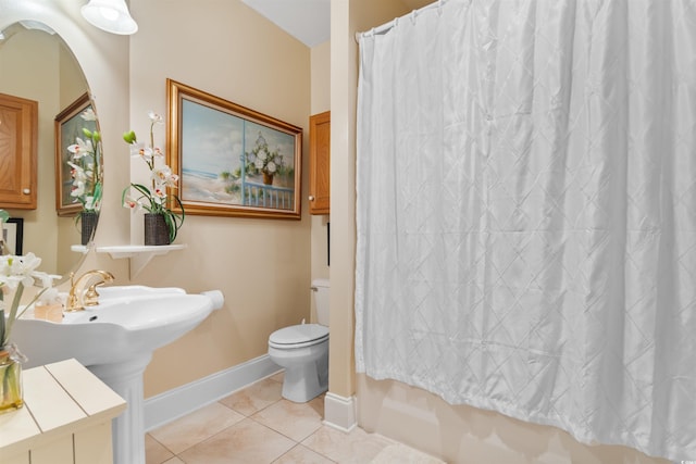 2180 Waterview Dr Unit 634, North Myrtle Beach, SC 29582 - full bathroom featuring baseboards, tile patterned flooring, shower / bath combo with shower curtain, and toilet