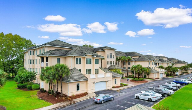 2180 Waterview Dr Unit 634, North Myrtle Beach, SC 29582 - exterior space featuring uncovered parking, an attached garage, and a residential view