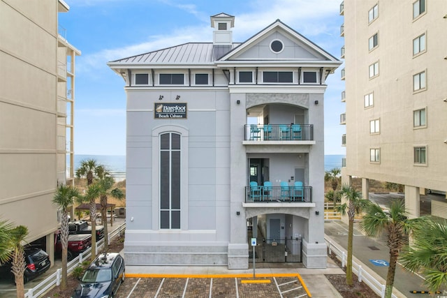 view of building exterior featuring a water view