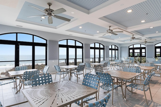 2180 Waterview Dr Unit 634, North Myrtle Beach, SC 29582 - view of patio with outdoor dining area, a water view, ceiling fan, and visible vents