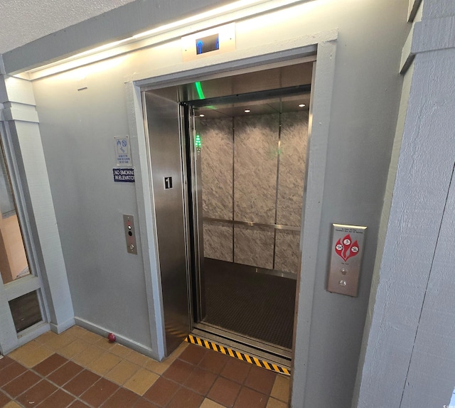 doorway to property with elevator