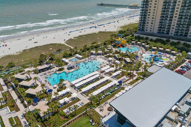 bird's eye view with a view of the beach and a water view