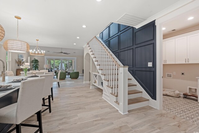 405 N Highland Way, Myrtle Beach, SC 29572 - staircase with recessed lighting, ceiling fan, and a chandelier