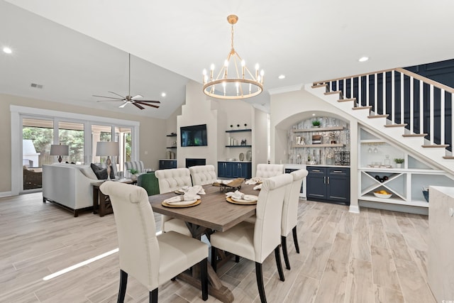 405 N Highland Way, Myrtle Beach, SC 29572 - dining space with a chandelier, light wood-type flooring, recessed lighting, stairway, and lofted ceiling