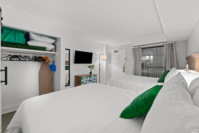 bedroom featuring hardwood / wood-style flooring