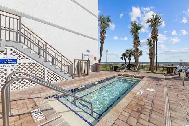 view of pool with a patio