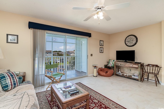 living room with ceiling fan