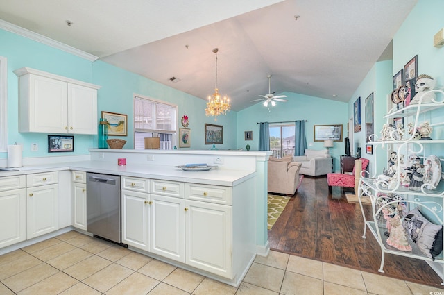 kitchen with light wood-type flooring, stainless steel dishwasher, white cabinetry, kitchen peninsula, and lofted ceiling