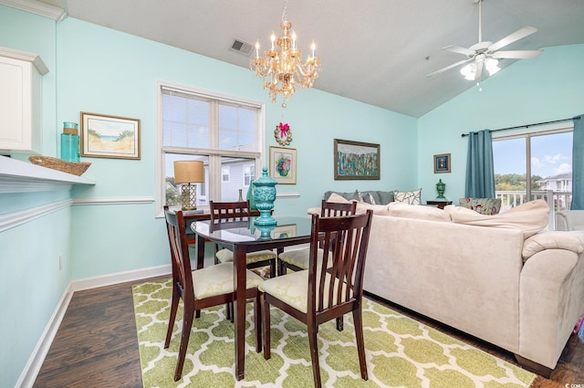 dining area featuring vaulted ceiling, ceiling fan with notable chandelier, and dark hardwood / wood-style flooring