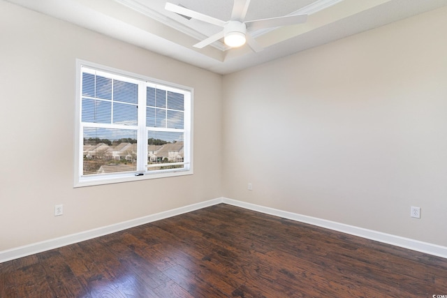 unfurnished room with dark wood-type flooring, baseboards, and a ceiling fan