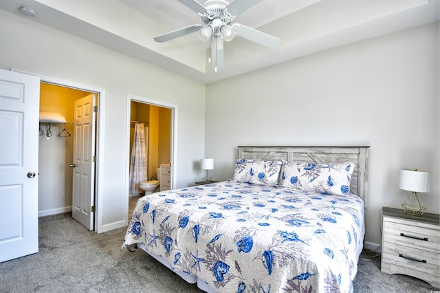 5801 Oyster Catcher Dr Unit 434, North Myrtle Beach, SC 29582 - bedroom featuring carpet, a spacious closet, ensuite bathroom, ceiling fan, and a closet