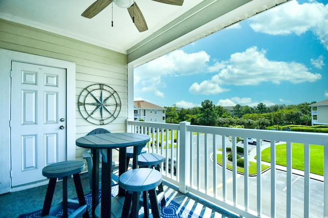 balcony featuring ceiling fan