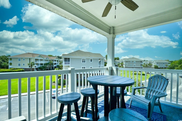 balcony featuring ceiling fan