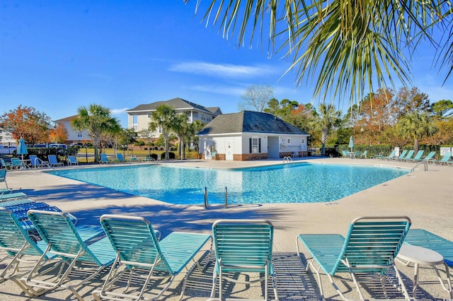 view of pool featuring a patio