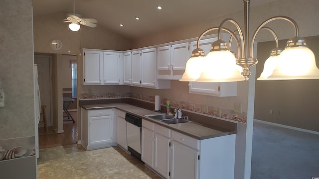 kitchen featuring lofted ceiling, white cabinets, a sink, ceiling fan, and dishwasher