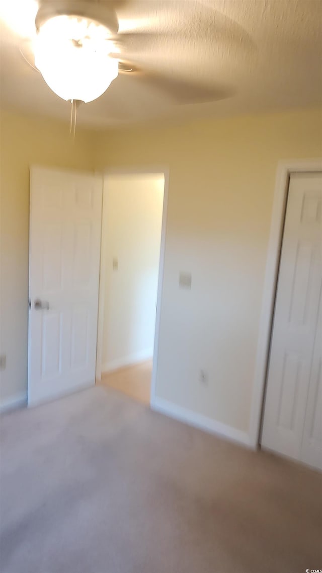 unfurnished bedroom with baseboards