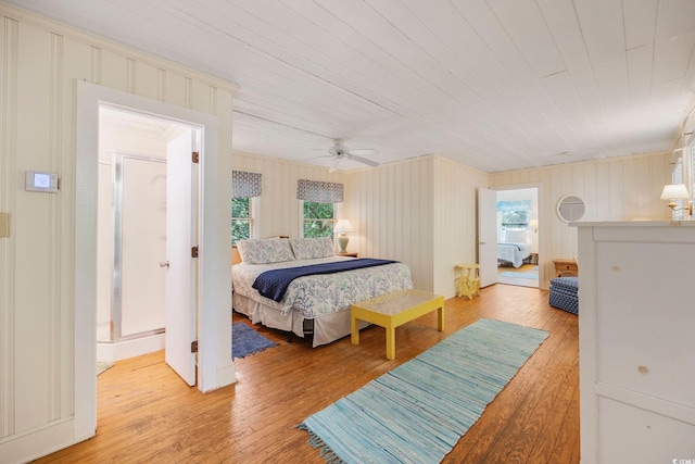 bedroom featuring ceiling fan and light hardwood / wood-style floors