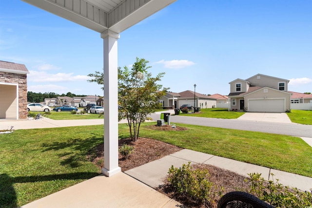 view of yard featuring a garage