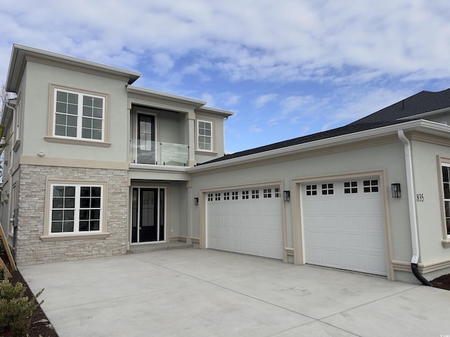 view of front of property with a garage