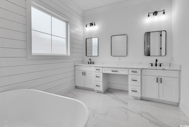 bathroom featuring ornamental molding, a bathing tub, vanity, and wood walls