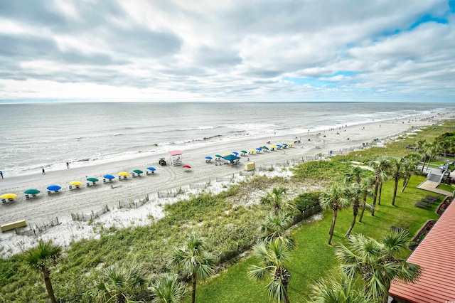 aerial view featuring a view of the beach and a water view