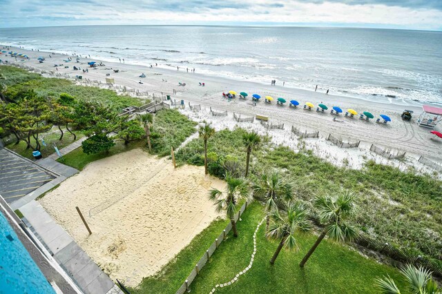 aerial view featuring a view of the beach and a water view