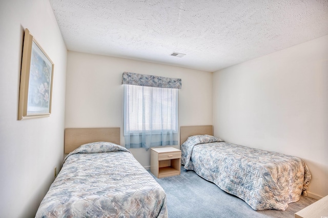 4103 Pinehurst Cir Unit Bb-12, Little River, SC 29566 - carpeted bedroom featuring a textured ceiling