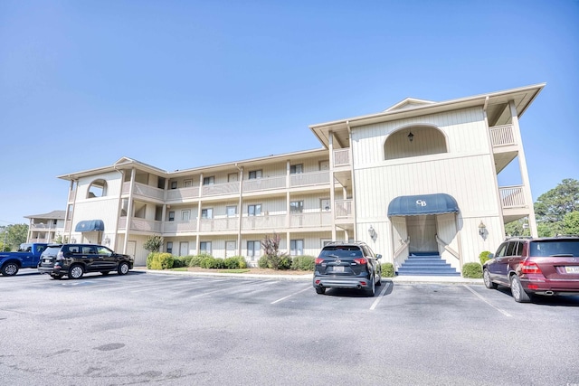 4103 Pinehurst Cir Unit Bb-12, Little River, SC 29566 - view of apartment building / complex featuring uncovered parking