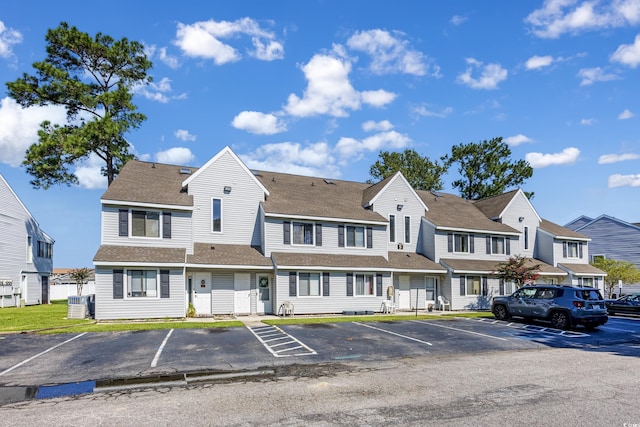 view of property featuring central AC unit