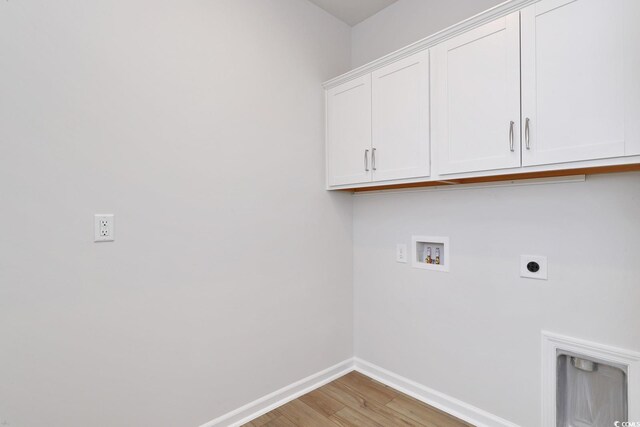 bathroom featuring sink, toilet, and lofted ceiling