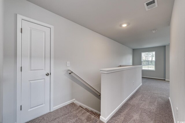 garage featuring a garage door opener and electric panel