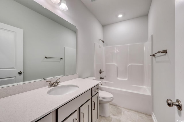 full bathroom with bathing tub / shower combination, tile patterned floors, vanity, and toilet