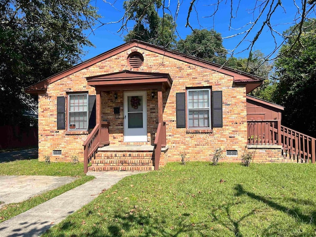 view of front of home with a front yard