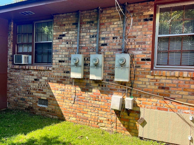 doorway to property featuring cooling unit