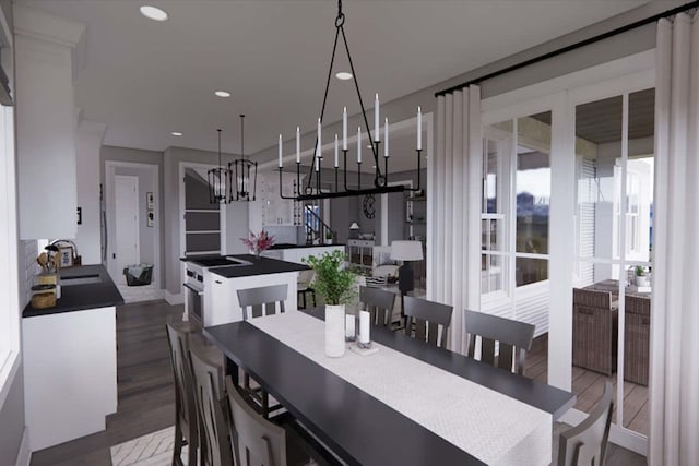 dining room featuring sink, dark wood-type flooring, and a chandelier