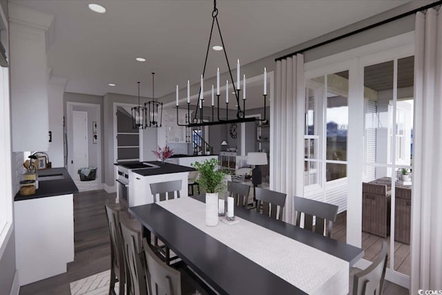 dining room with a chandelier, wood finished floors, baseboards, and recessed lighting