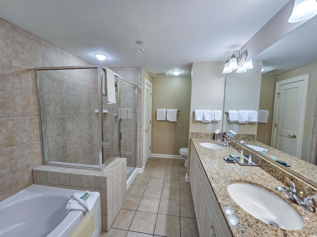 full bathroom featuring vanity, toilet, separate shower and tub, and tile patterned flooring