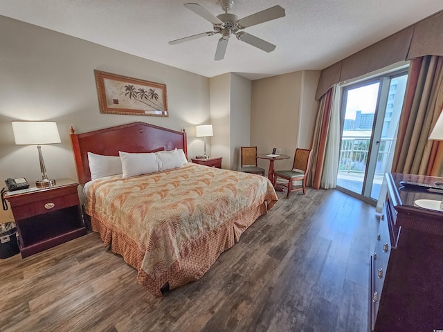 bedroom with access to exterior, hardwood / wood-style flooring, a textured ceiling, and ceiling fan