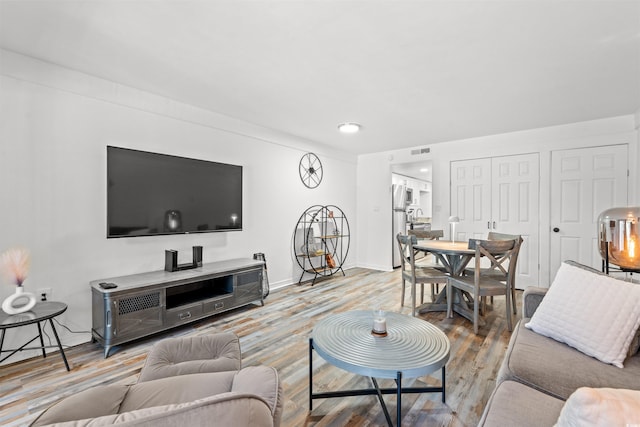 living room with hardwood / wood-style flooring