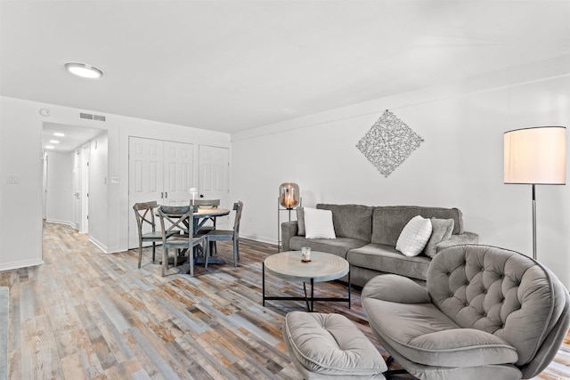 living room featuring light hardwood / wood-style floors