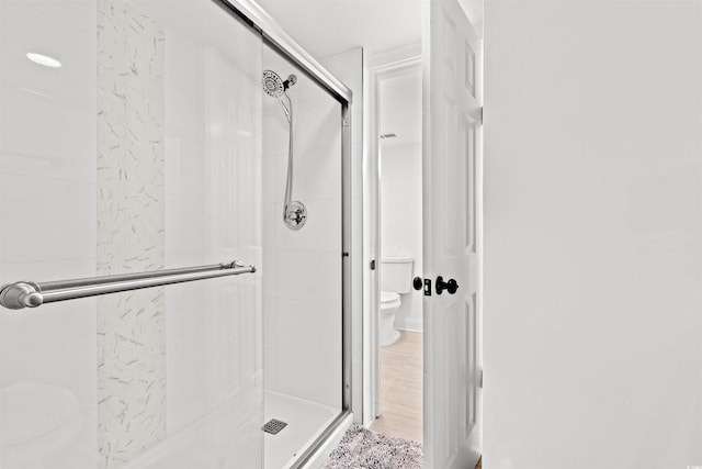 7509 N Ocean Blvd Unit 103, Myrtle Beach, SC 29572 - full bathroom featuring toilet and a shower stall