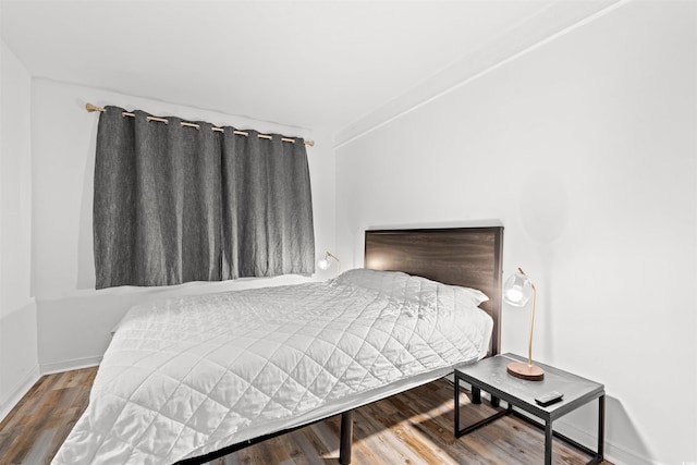 bedroom featuring hardwood / wood-style floors