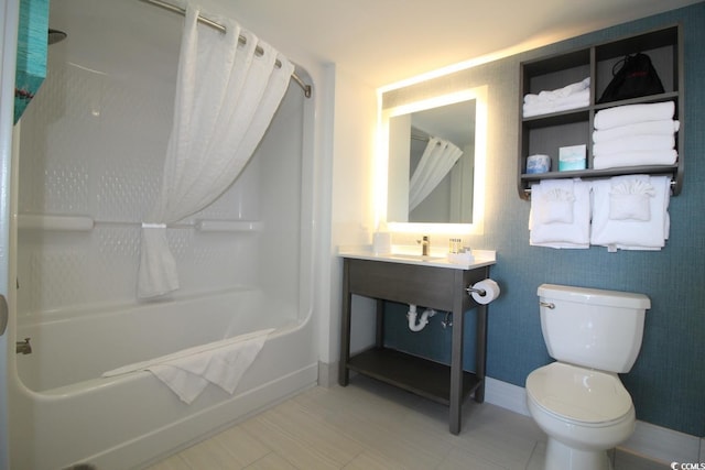 full bathroom featuring shower / bath combination with curtain, vanity, and toilet