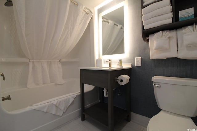 bathroom featuring tile patterned floors and toilet