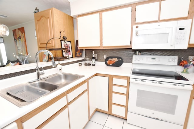 kitchen featuring ornamental molding, white appliances, tasteful backsplash, sink, and light tile patterned flooring