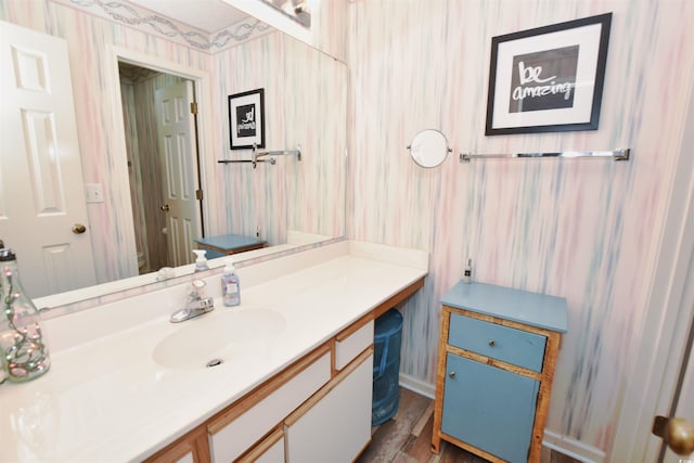9550 Dunes Gable Dr Unit F, Myrtle Beach, SC 29572 - bathroom with wallpapered walls and vanity