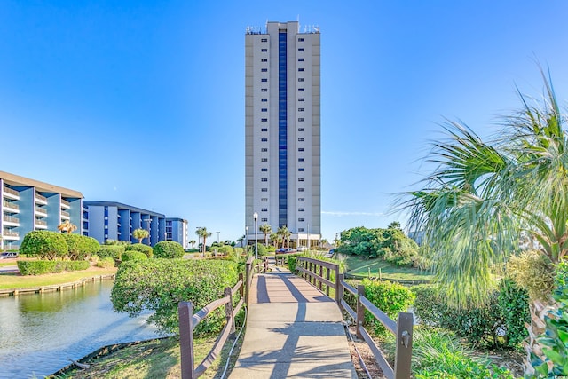 view of community with a water view