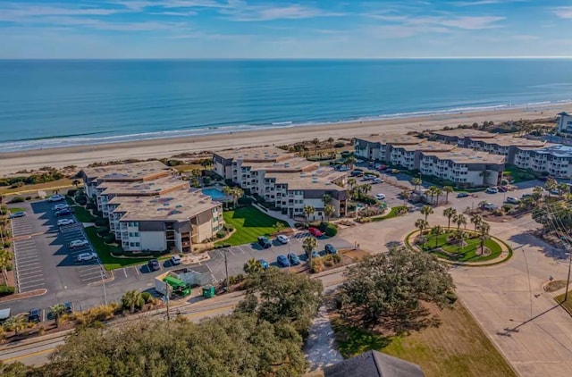 aerial view with a beach view and a water view